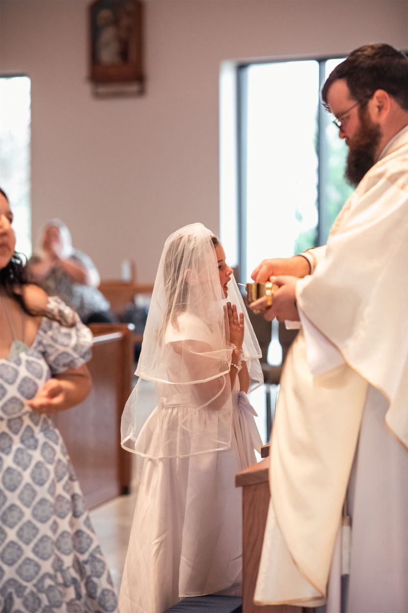 2024-03-09-first-communion-mass-0011.jpg