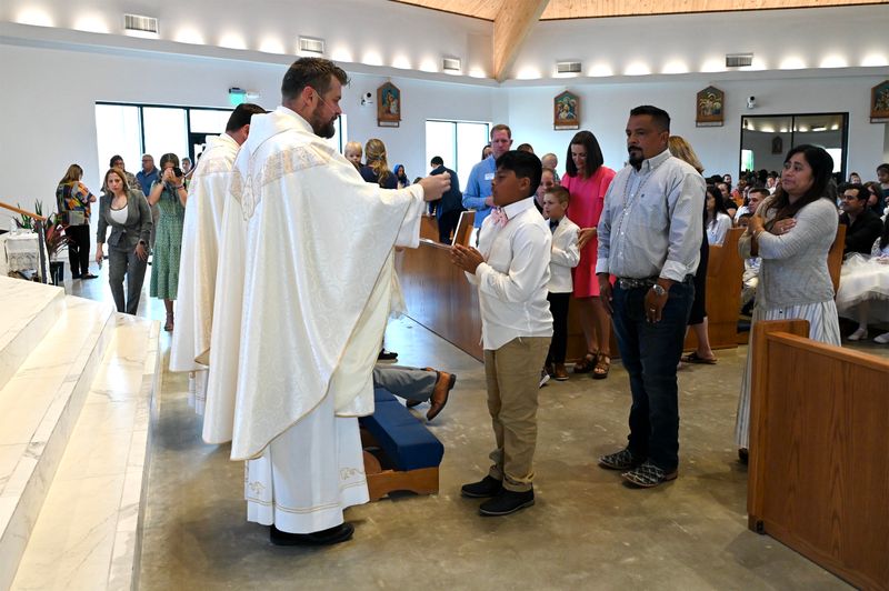 2025-04-05-first-communion-mass-0470.jpg