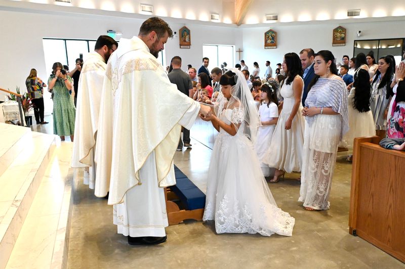 2025-04-05-first-communion-mass-0517.jpg