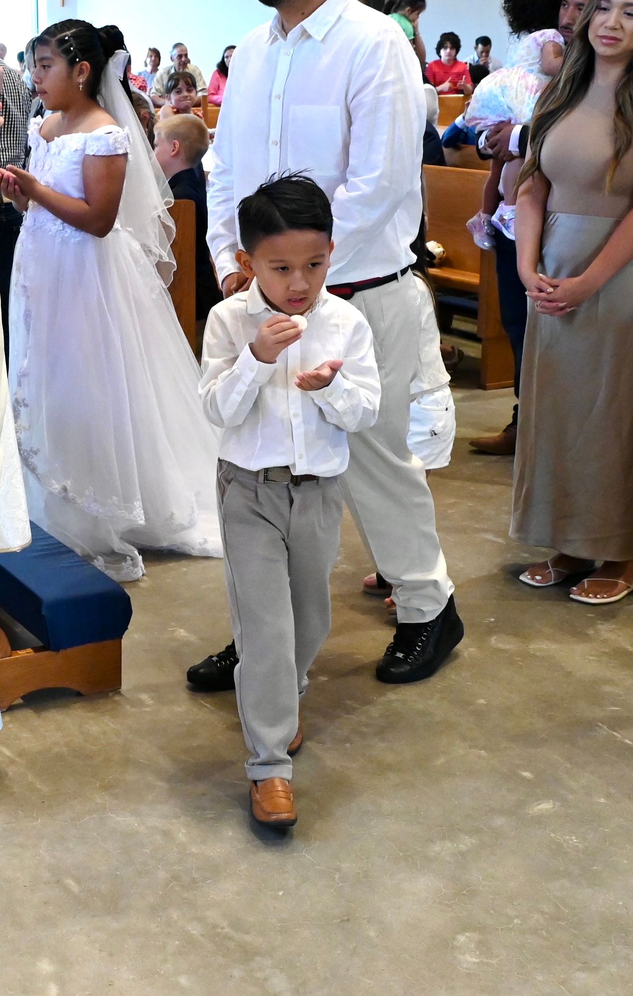 2025-04-05-first-communion-mass-0585.jpg