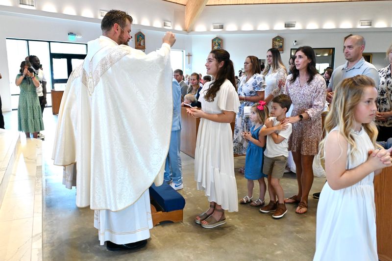 2025-04-05-first-communion-mass-0645.jpg