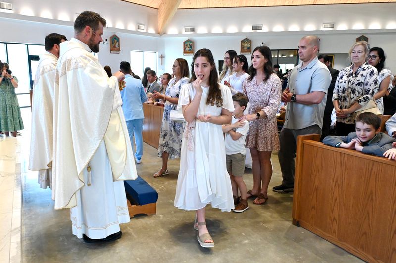 2025-04-05-first-communion-mass-0650.jpg
