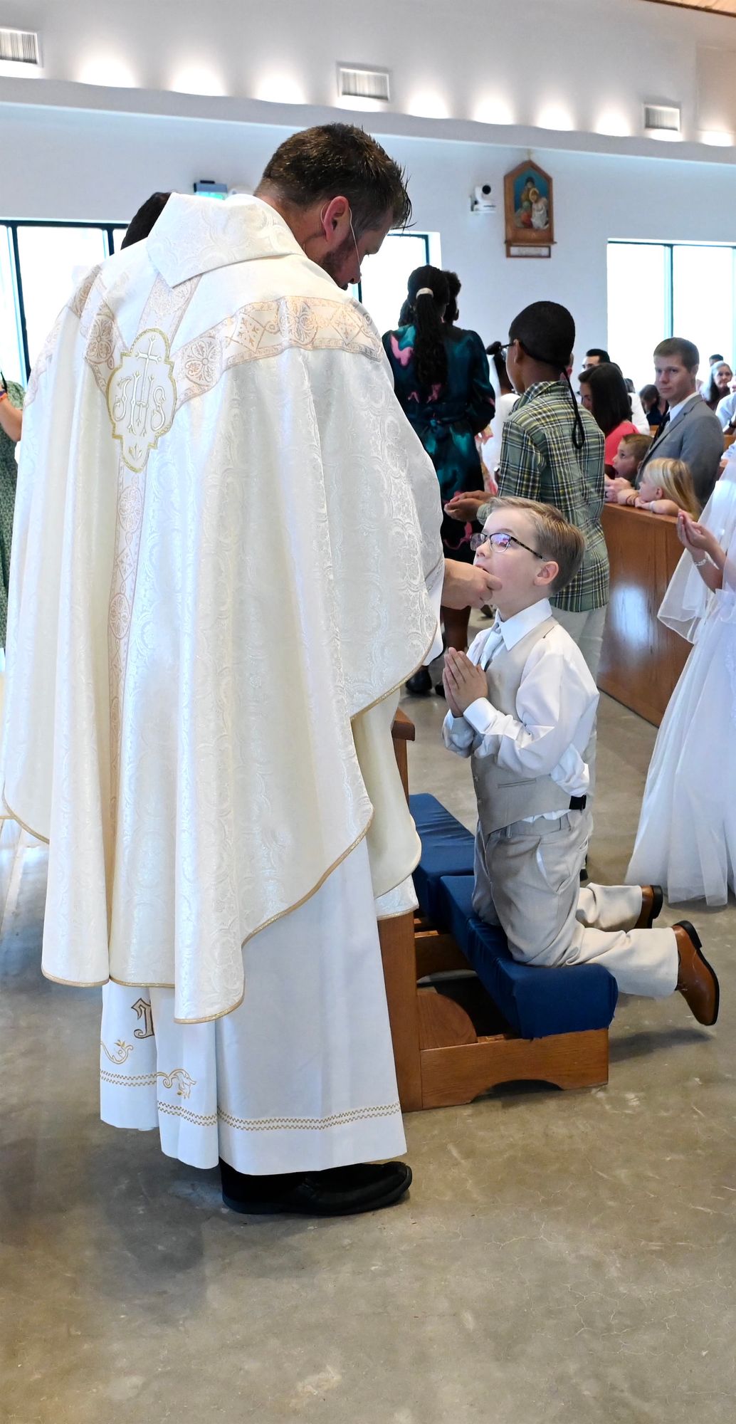 2025-04-05-first-communion-mass-0673.jpg