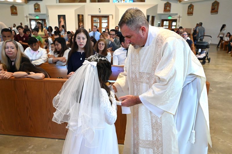 2025-04-05-first-communion-mass-0695.jpg