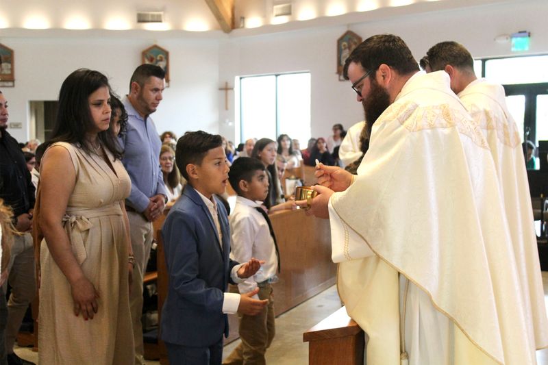 2025-04-05-first-communion-mass-0730.jpg