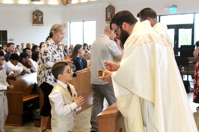 2025-04-05-first-communion-mass-0788.jpg