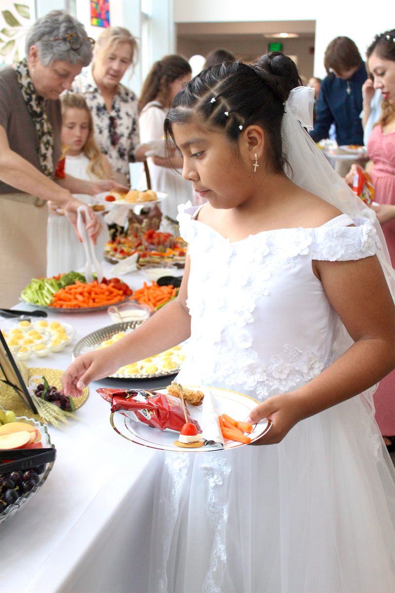 2025-04-05-first-communion-mass-0814.jpg